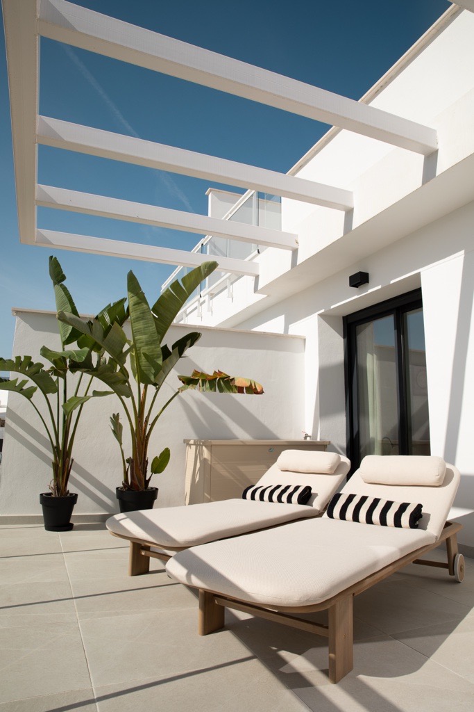 Ligbedden onder de pergola